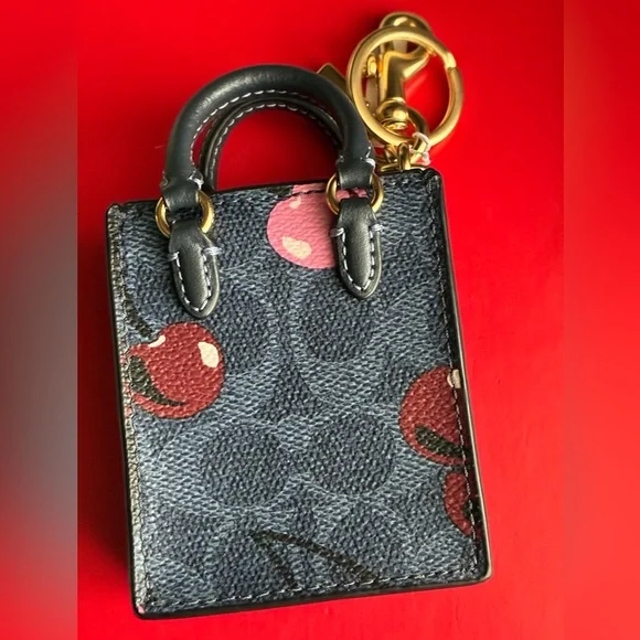 Coach Navy and Burgundy Cherry Print Key Holder - Picture 15 of 15